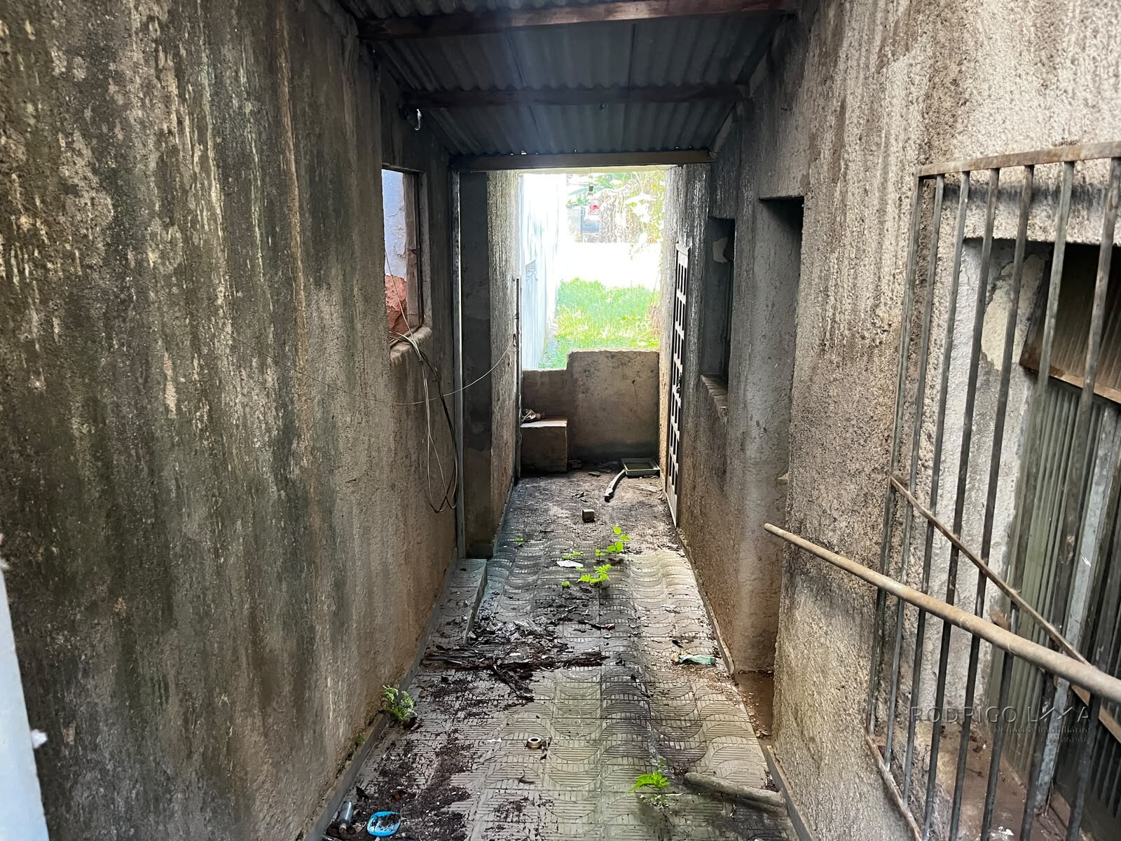 Lote com casa para venda no centro de São Lourenço Mg